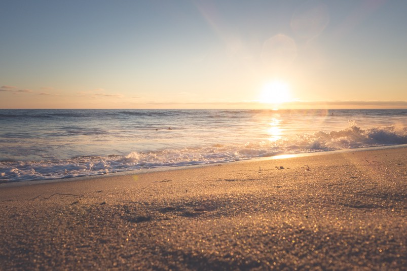 sun going down on beach